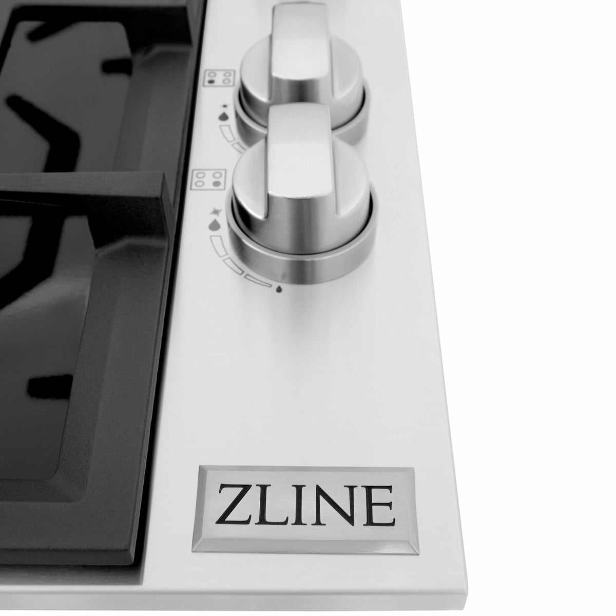 Cooktop control panel with two silver knobs and the ZLINE logo