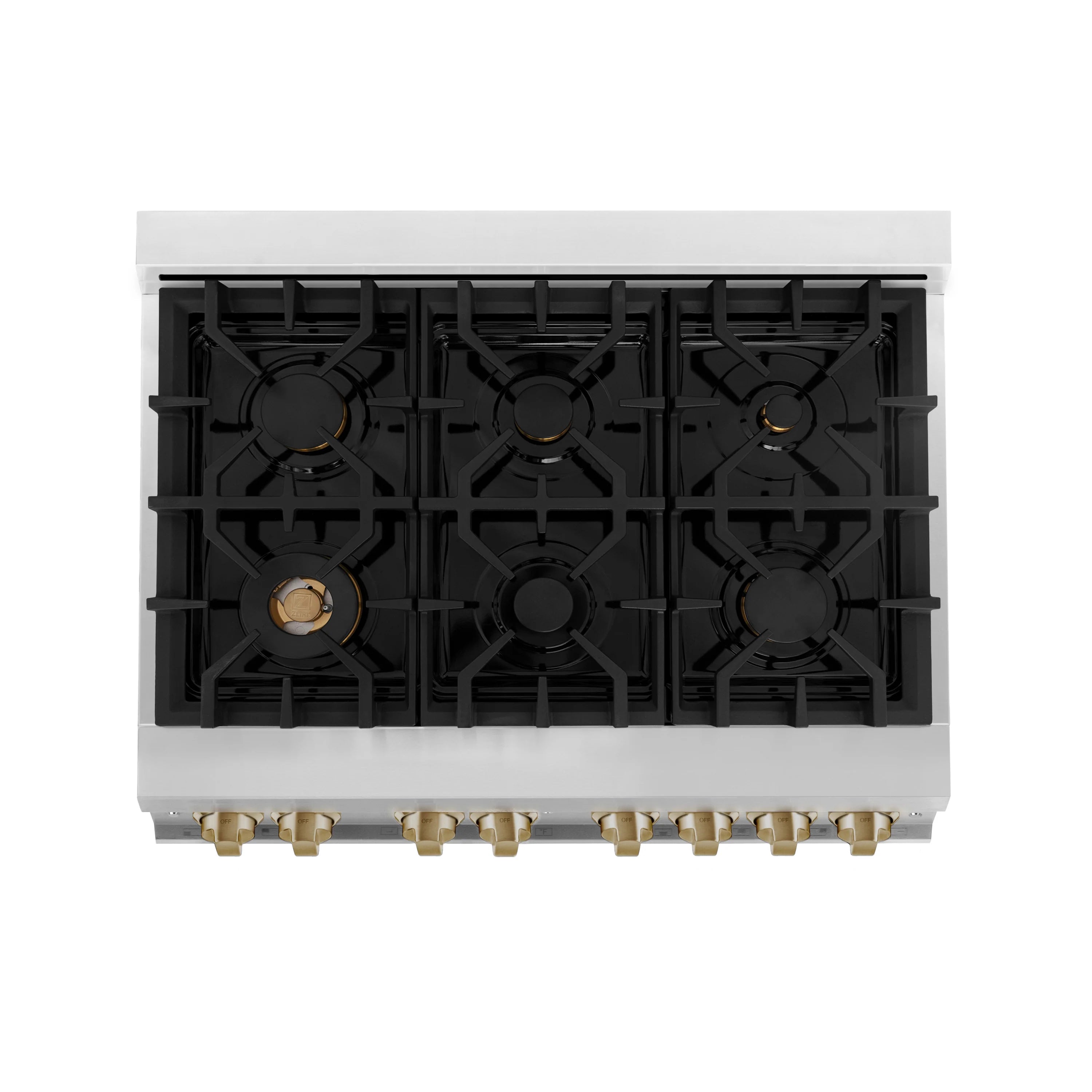 Under cooktop view showing black burner bases and grates on a white range