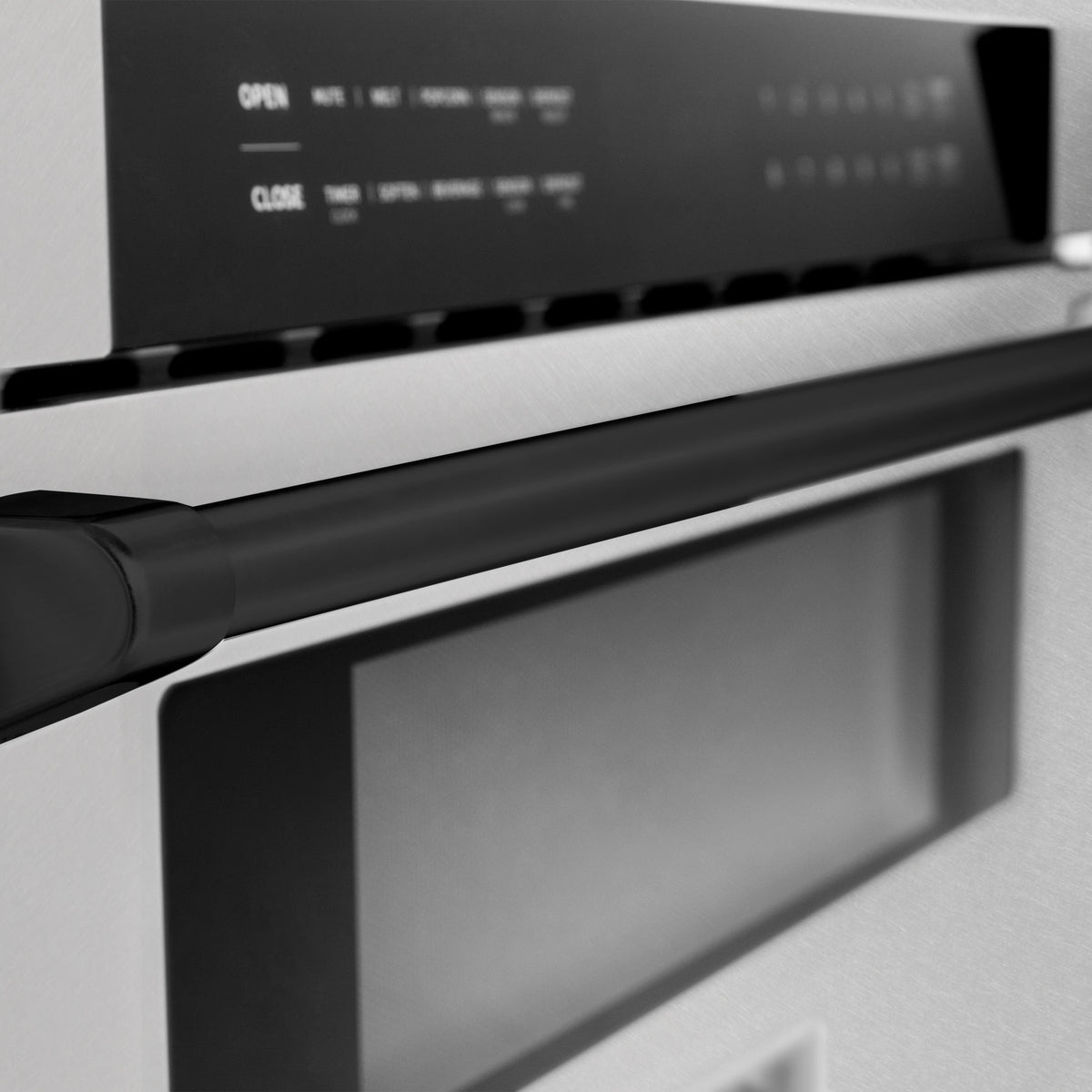 Close-up of microwave drawer control panel and matte black handle trim