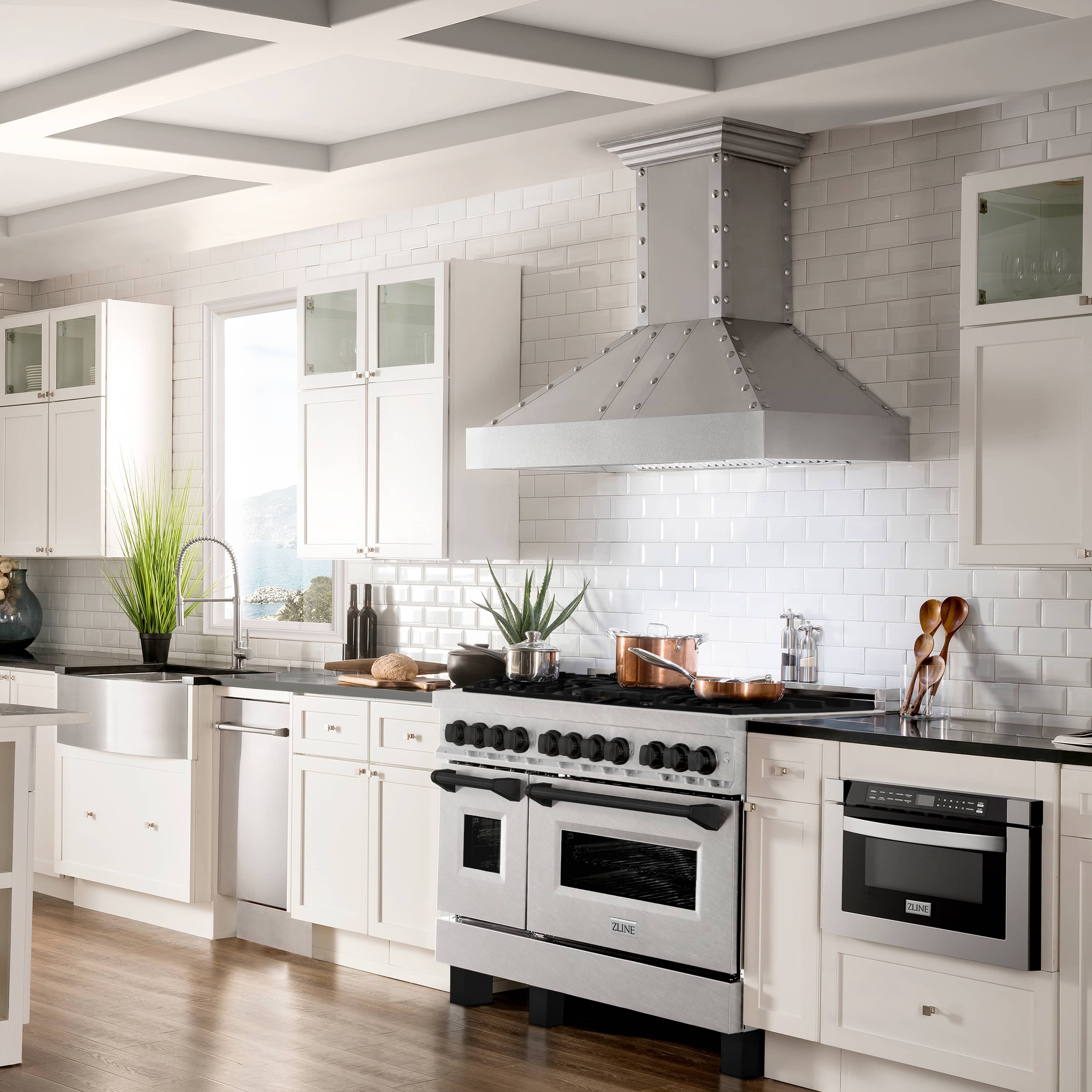 Dual fuel range in a kitchen with open stovetop area and oven door windows