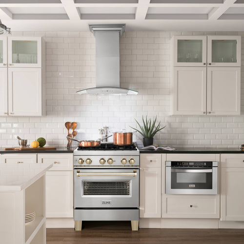 Dual fuel range with wall-mounted hood and built-in oven in kitchen