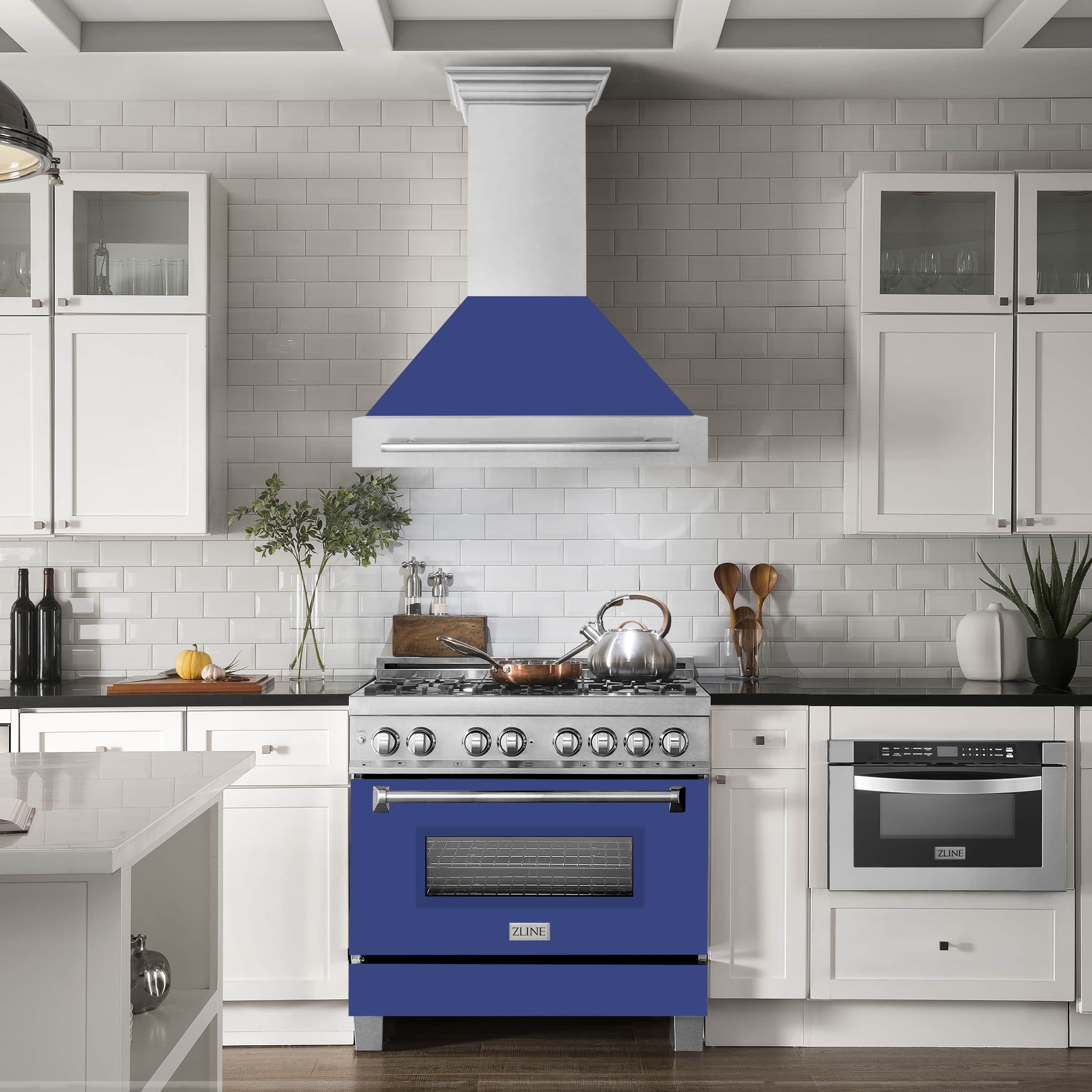 Wall mount range hood above cooktop, satin stainless chimney with blue matte canopy