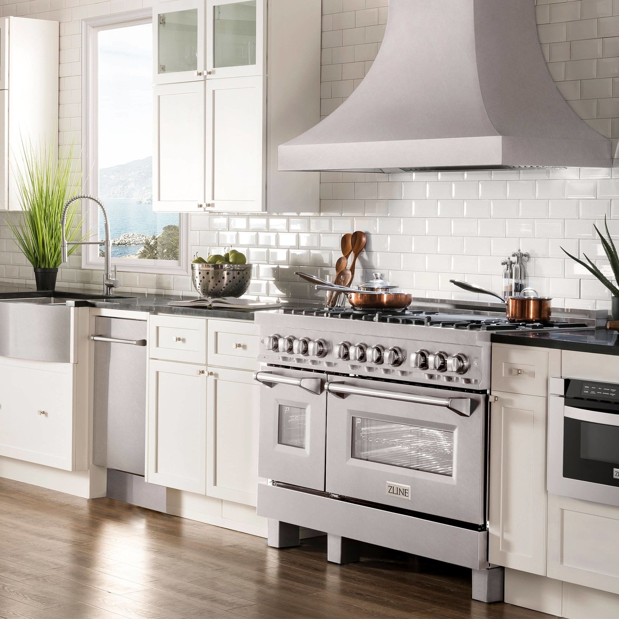 Built-in dishwasher with stainless steel front panel and traditional handle