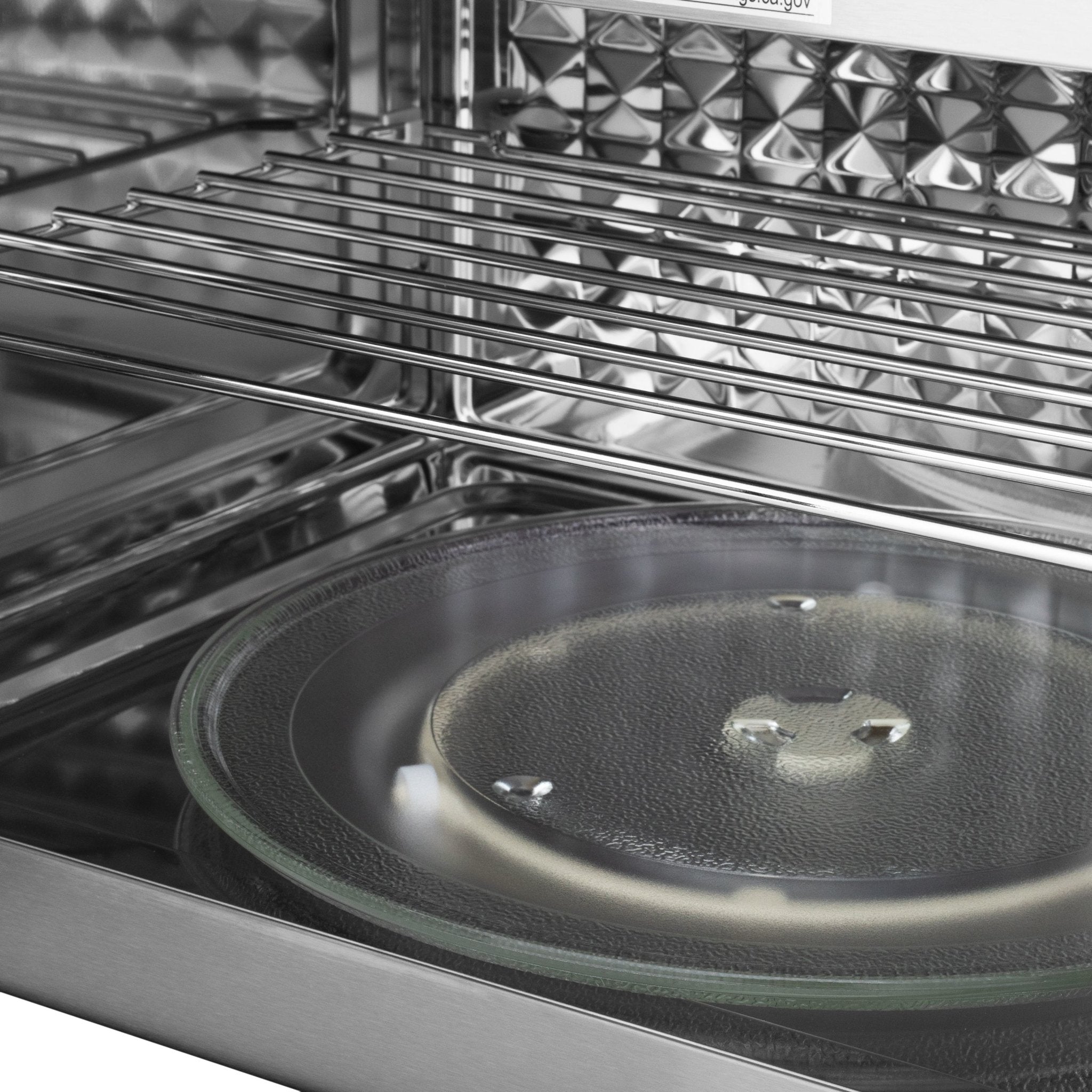 ZLINE oven interior with metal racks and round glass baking pan