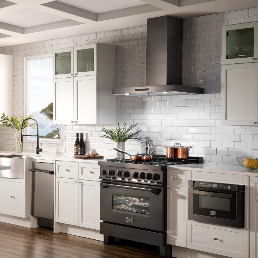 Black stainless steel convertible wall mount range hood over a gas cooktop