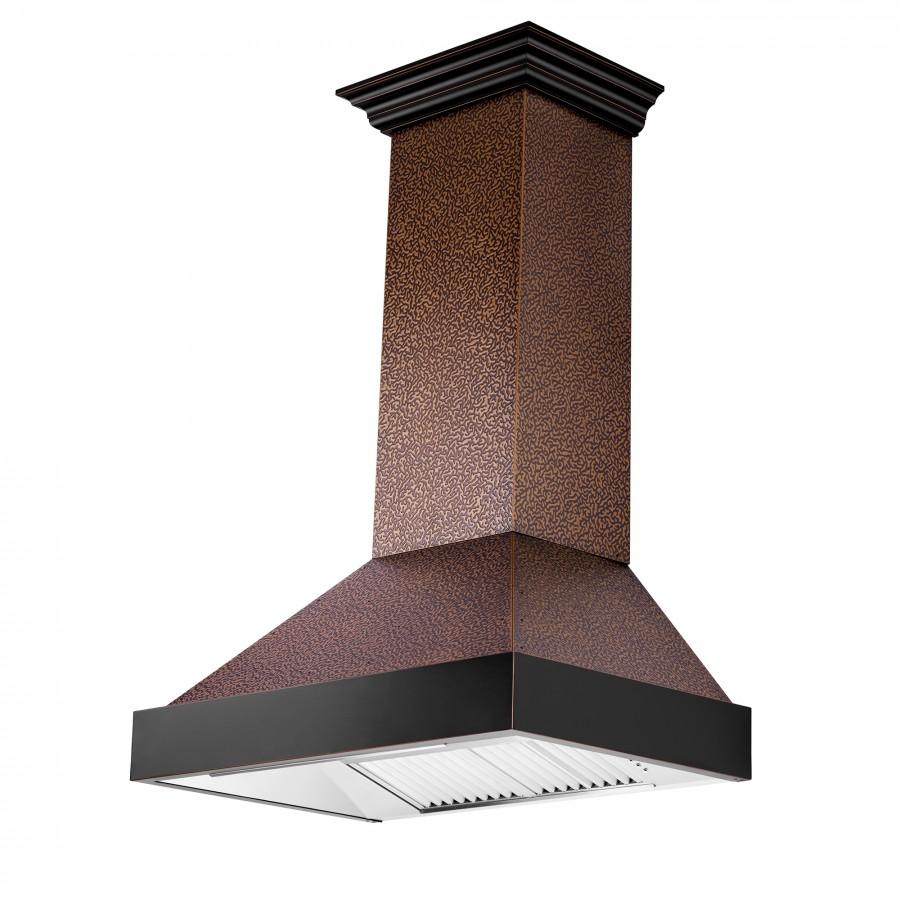 Hammered copper-finish wall range hood chimney with dark underside and vent opening
