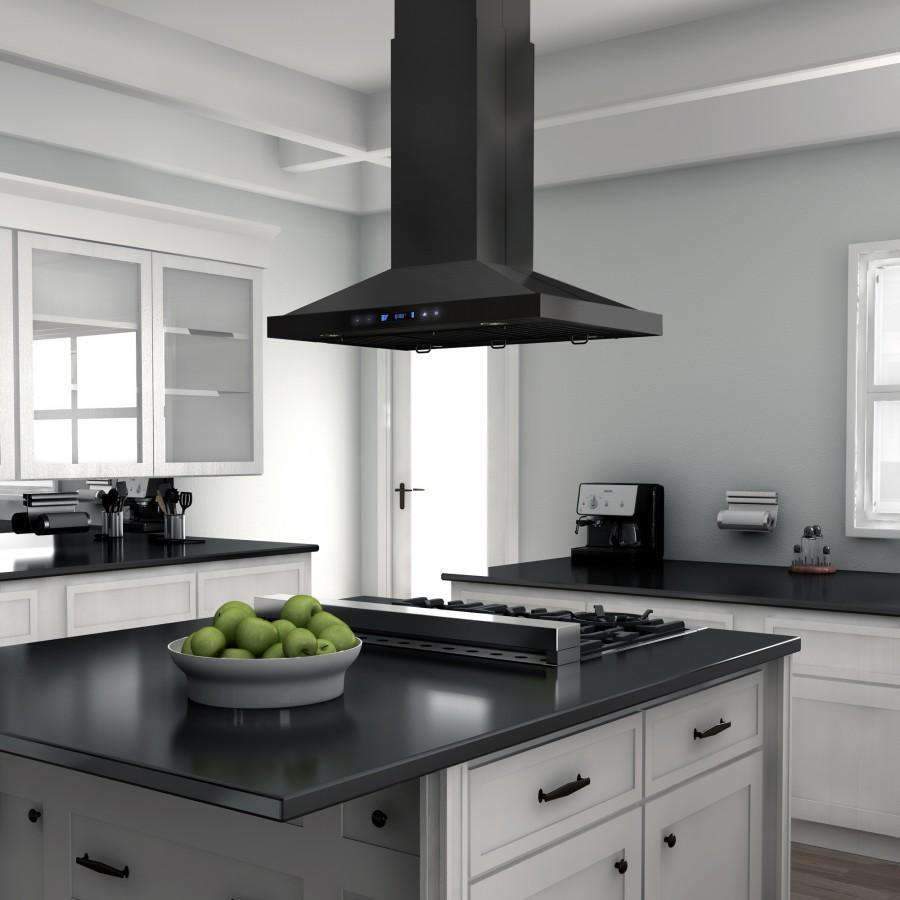Black stainless steel island range hood with chimney over a kitchen cooktop