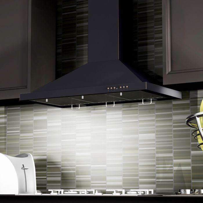 Black wall range hood with angled canopy and visible vent panel above the cooktop.