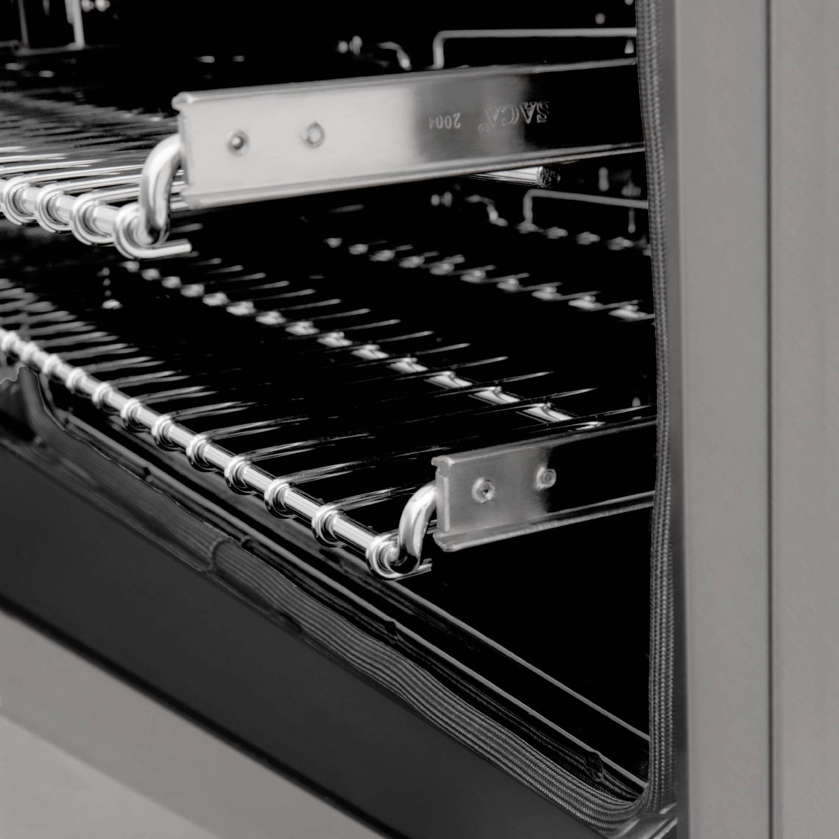 Oven rack rails and heating element inside stainless steel oven