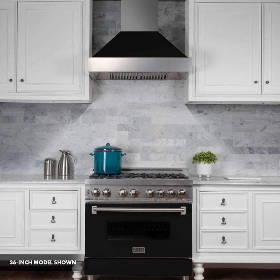 Dual fuel range with stainless burner grates, black oven door, and back chimney hood