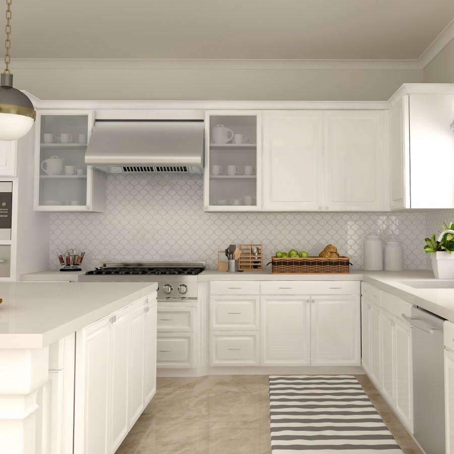 Stainless steel under-cabinet range hood installed above the cooktop