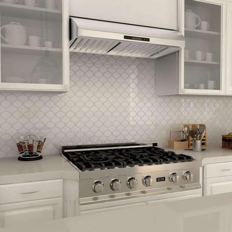Under-cabinet range hood above gas range with stainless baffle filters and controls