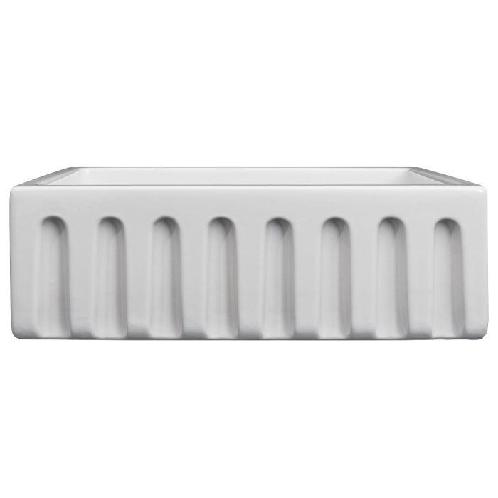 White apron-front single-bowl fireclay sink front with vertical grooves
