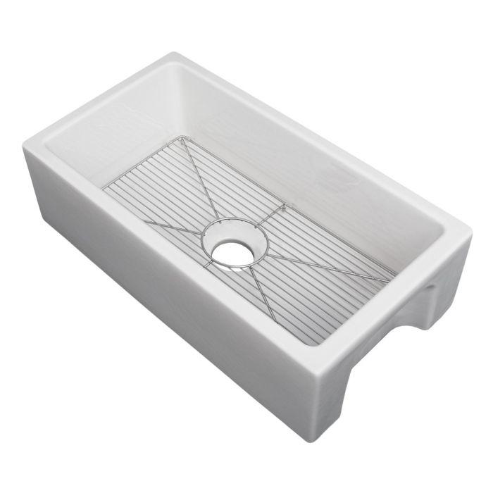 White single-bowl sink showing chrome bottom grid over drain opening
