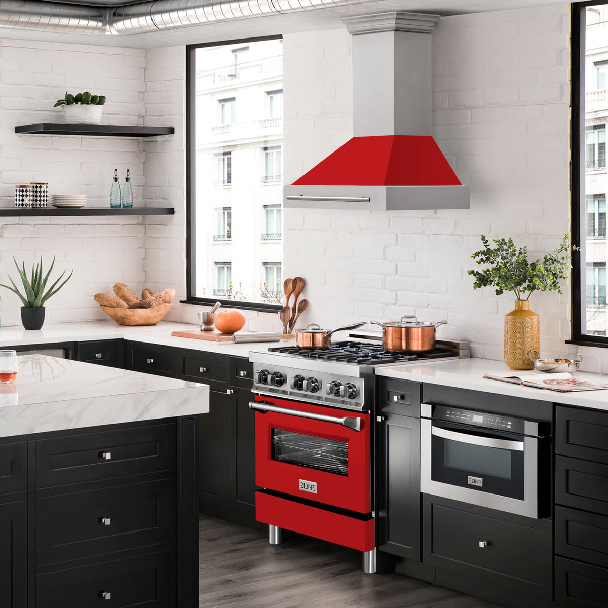 Wall mount range hood with red matte canopy and stainless chimney above a stove