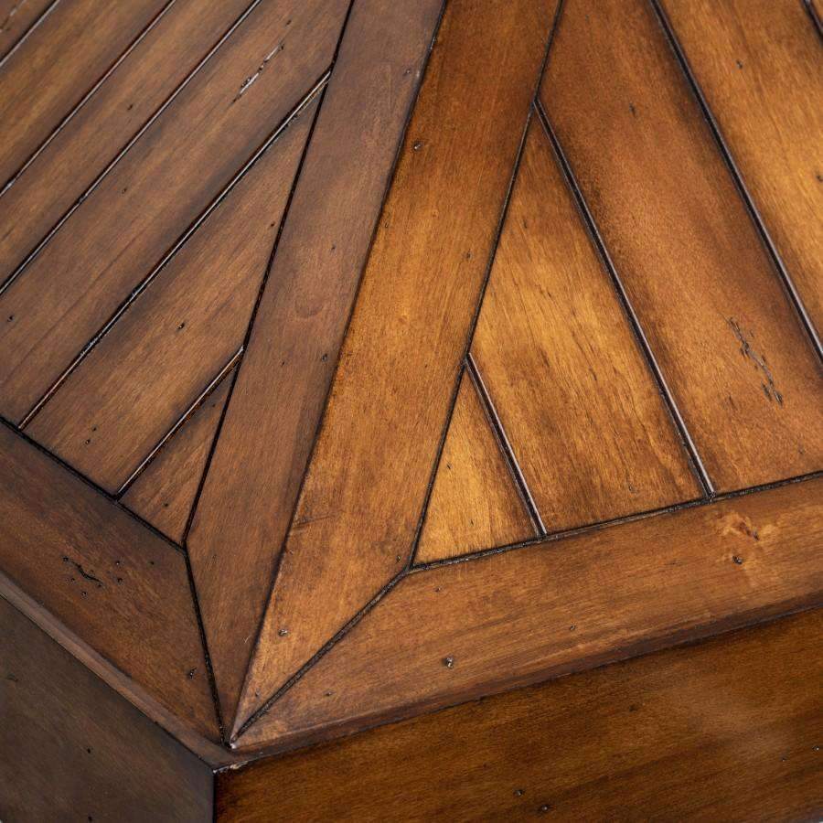 Rustic light wood range hood chimney panel with carved plank texture