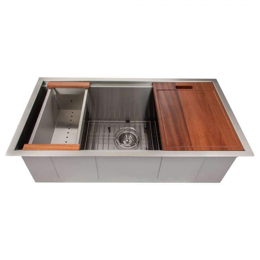 Undermount stainless steel sink showing double side compartments and wood board over basin.