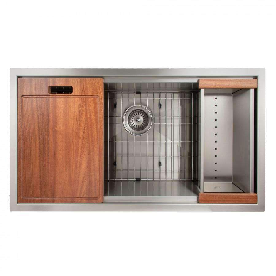 Stainless steel undermount sink with wood cutting boards and bottom rack/drain area.