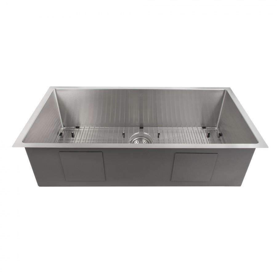 Rectangular stainless steel kitchen sink with bottom grid and centered drain