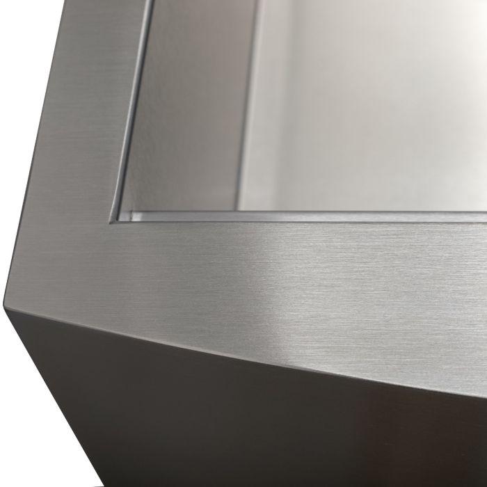 Stainless steel sink front corner with clean apron-style mounting edge