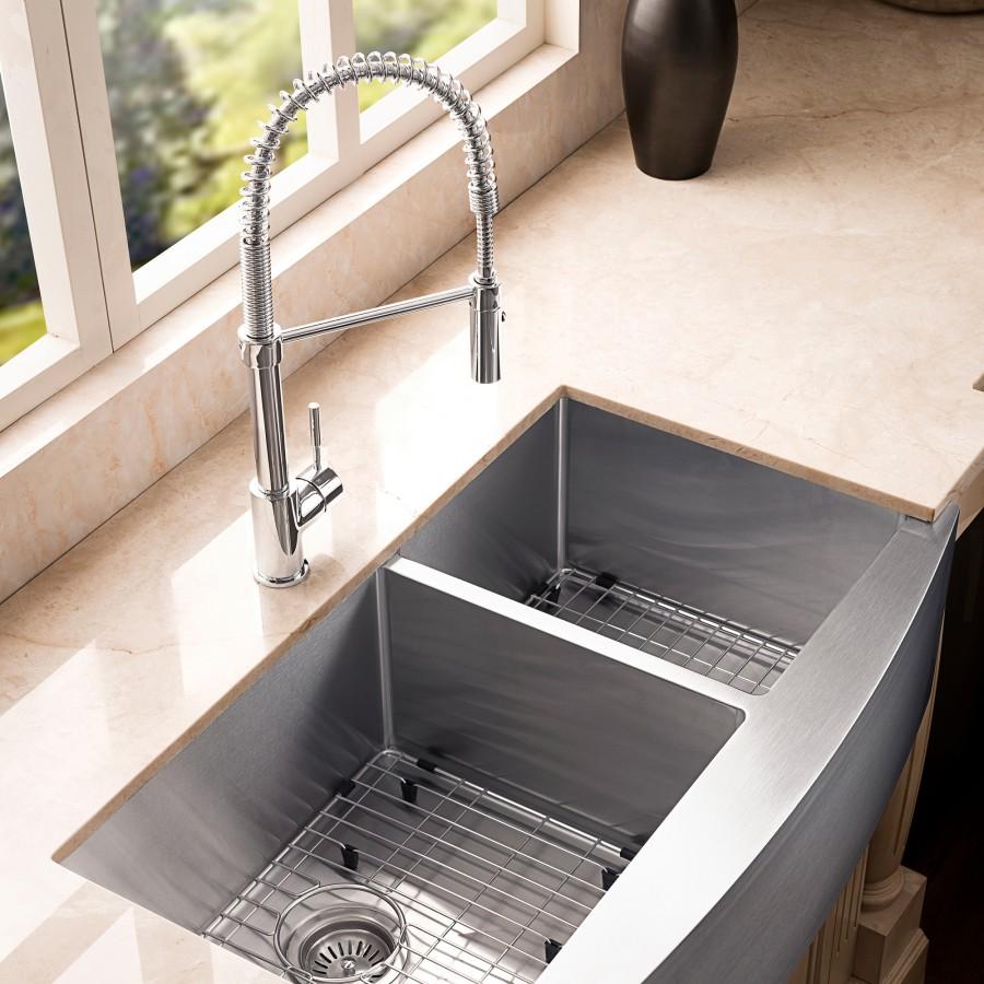 Stainless steel double-bowl farmhouse kitchen sink with bottom grid strainers and faucet