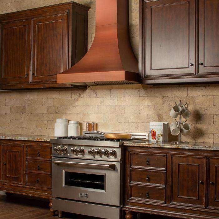 Copper-finish wall range hood with chimney style canopy