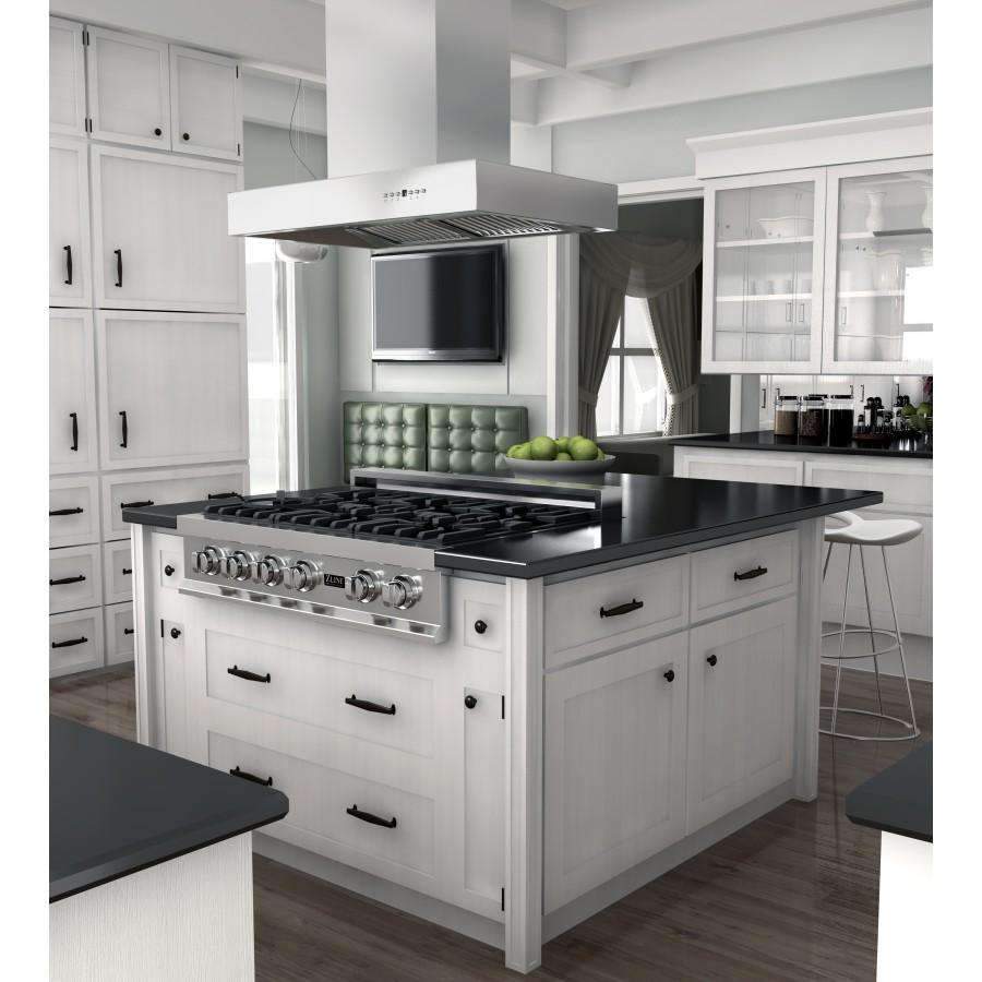 Stainless steel island range hood above black cooktop on white cabinetry