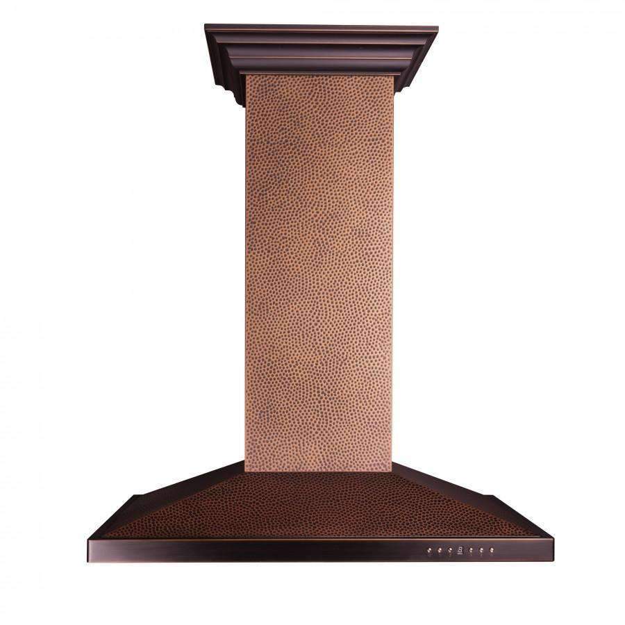 Hammered copper island range hood with dark top canopy and stainless baffle filters