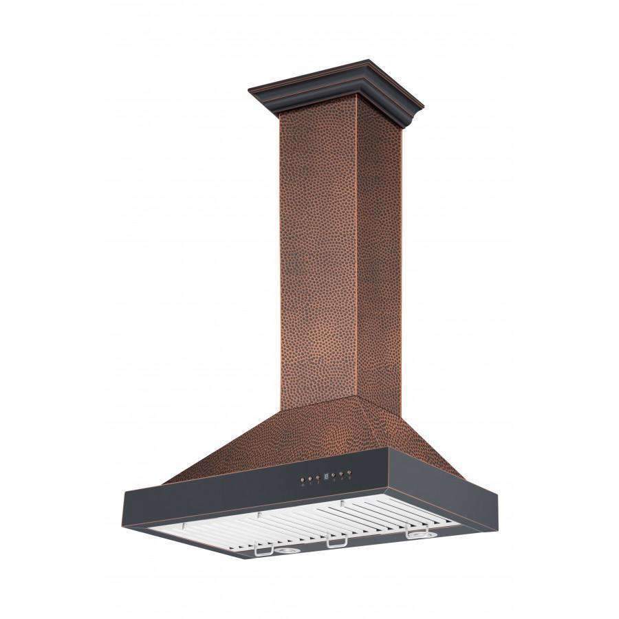 Wall-mount range hood with hand-hammered copper chimney and dark canopy