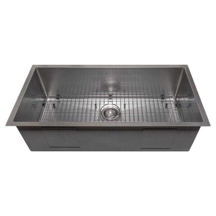 Single-bowl stainless steel sink with bottom grid, center drain, and undermount rim