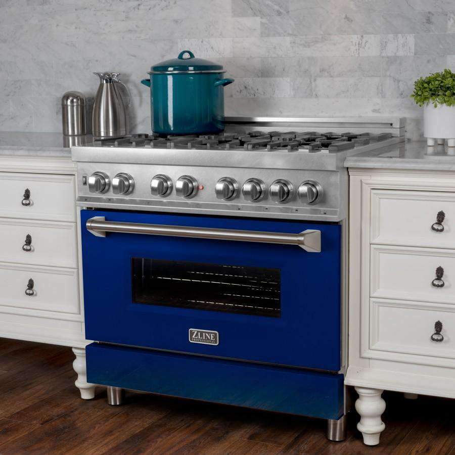 Stainless and blue dual fuel range front with burner knobs and dark oven window