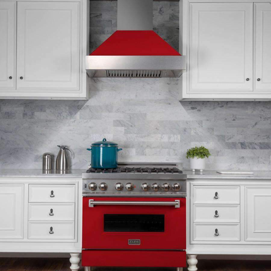 Red and stainless dual fuel range with black oven door window and burner grates
