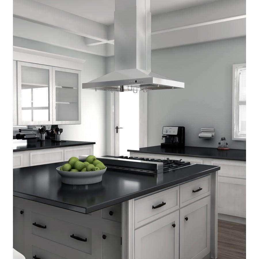 Stainless island range hood centered over a cooktop in a kitchen