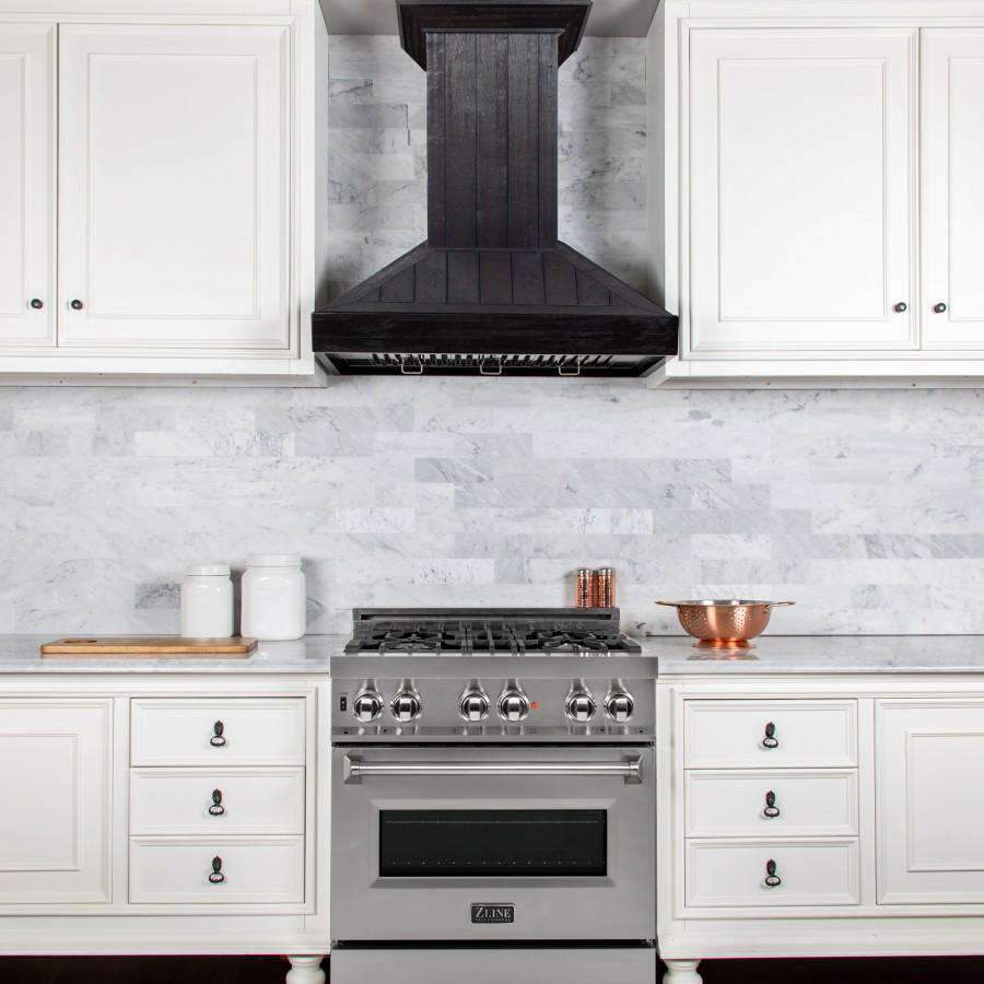 Wall-mounted wooden range hood with dark rustic crown molding trim