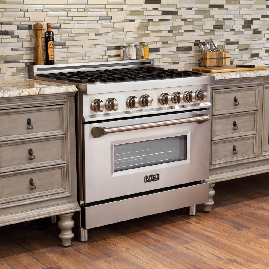 Stainless dual fuel range with glass oven door, control knobs, and six burners