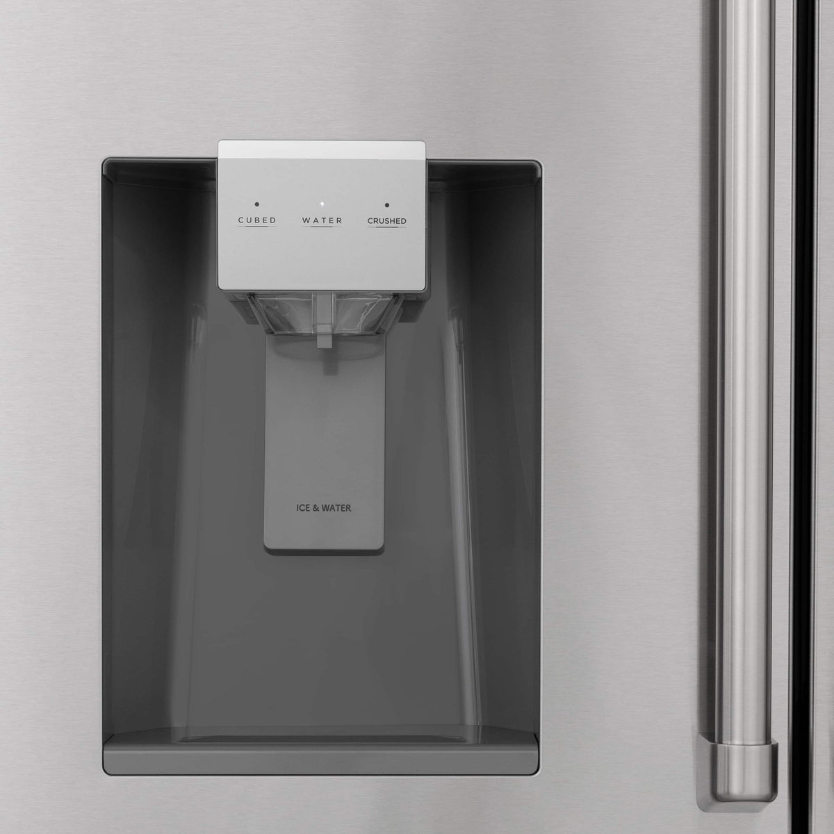 Stainless steel refrigerator door with water and ice dispenser panel
