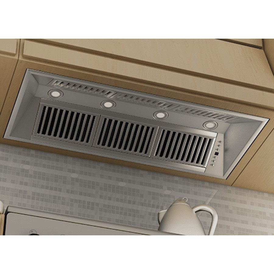 Stainless steel island range hood insert shown installed with vent slats and knobs