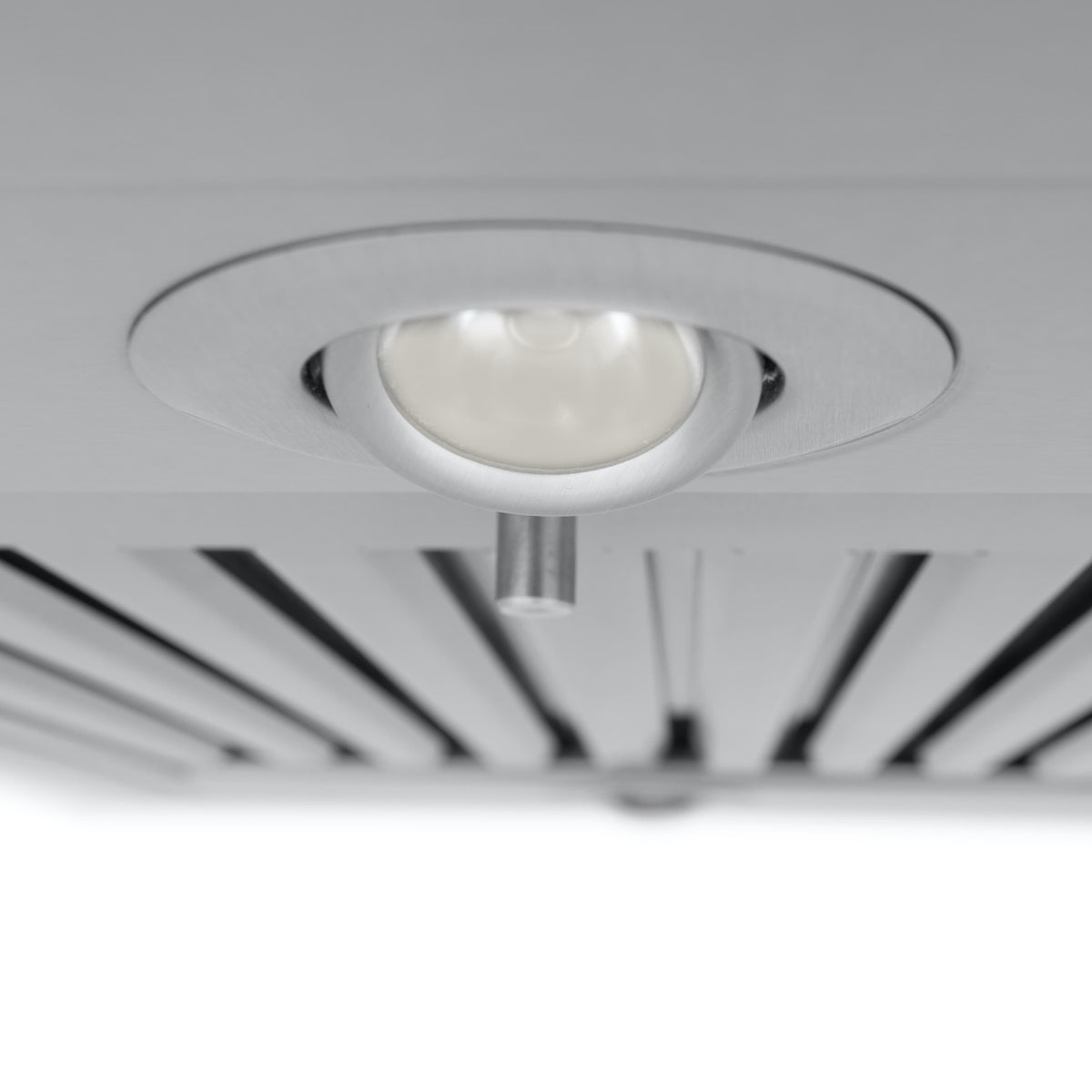 Stainless steel range hood ceiling light with round recessed bezel and spotlight lens