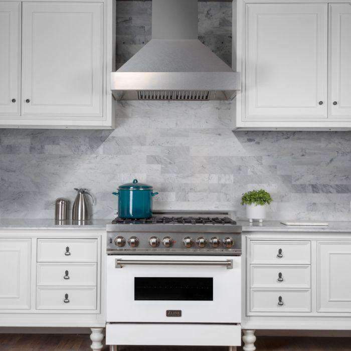 Satin stainless steel wall-mount range hood with rectangular chimney and vent grille