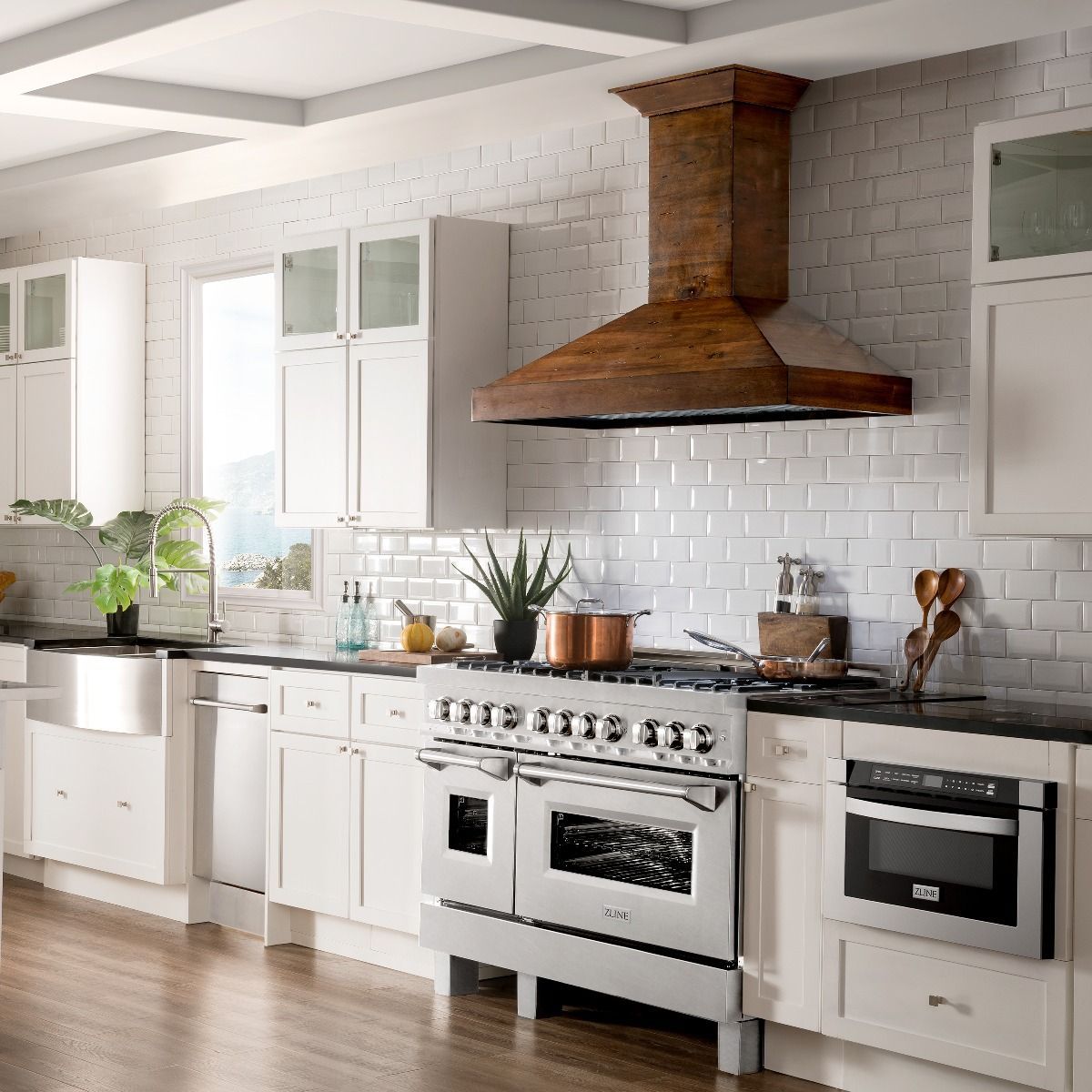 Stainless dual fuel range with gas burners and two oven doors
