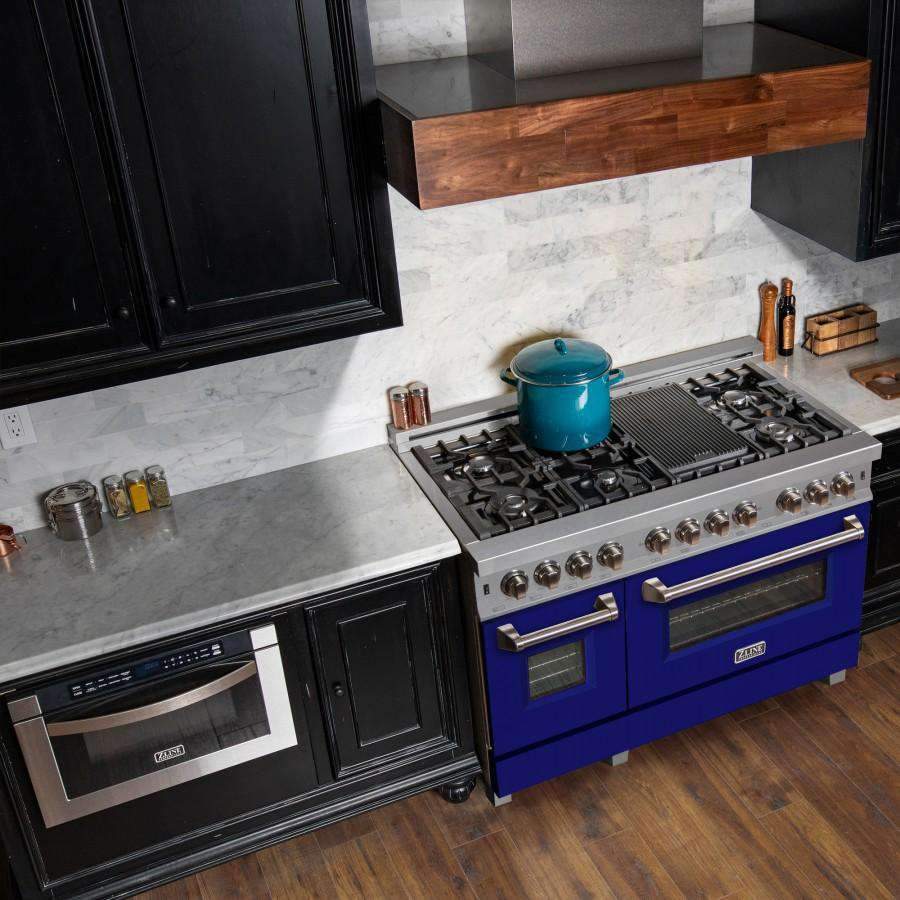 Dual fuel range with blue doors, stainless steel cooktop, and black burner grates