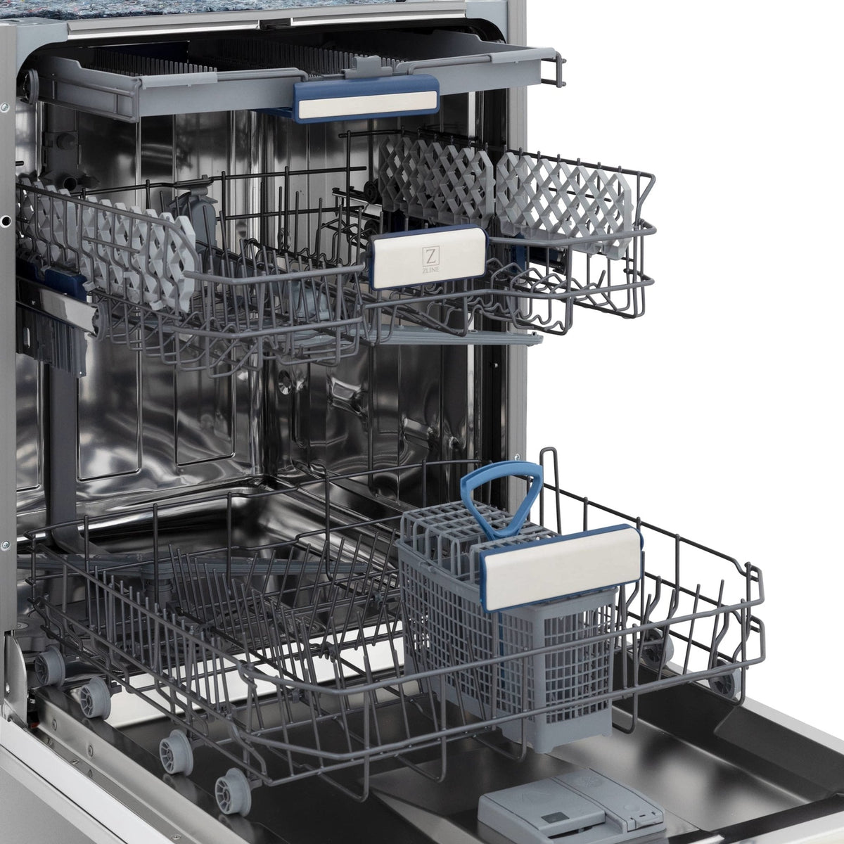 Dishwasher interior view with upper and lower racks and central spray area
