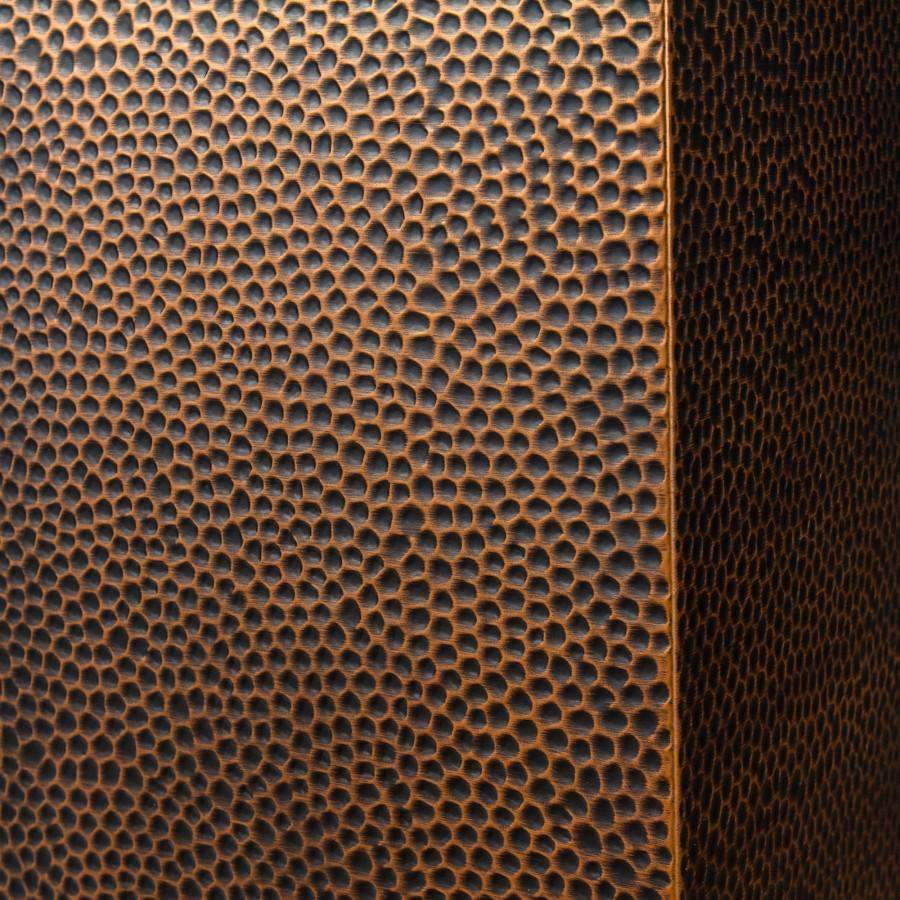 Close-up of copper chimney extension mesh texture, perforated vent pattern