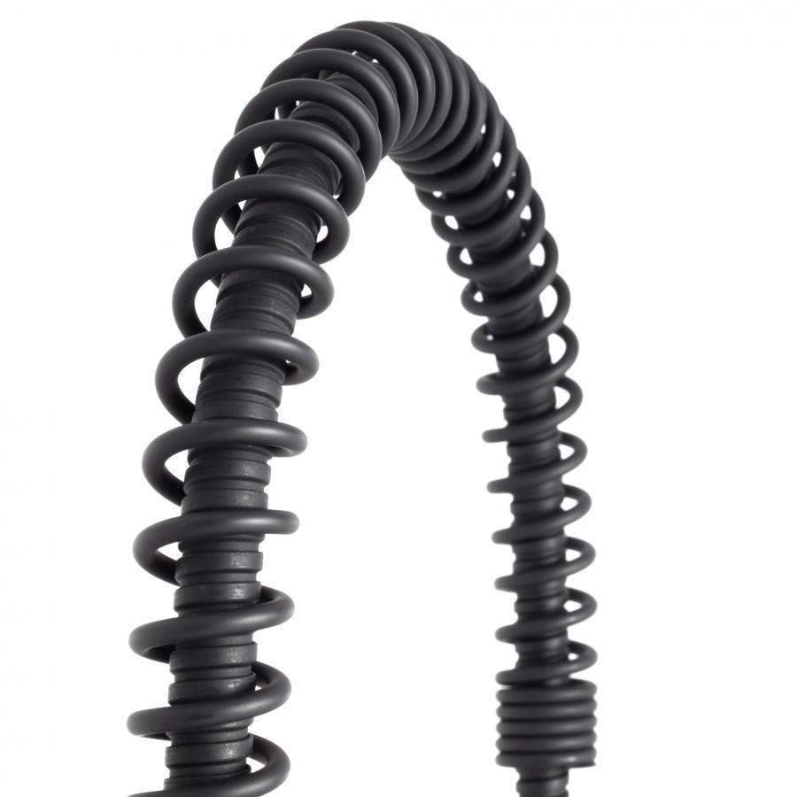 Black flexible hose with coiled spring section for a kitchen faucet.