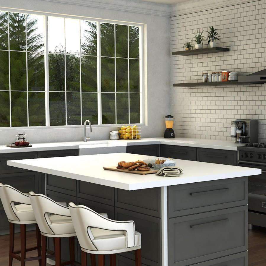 Chrome kitchen faucet with tall curved spout on modern kitchen sink
