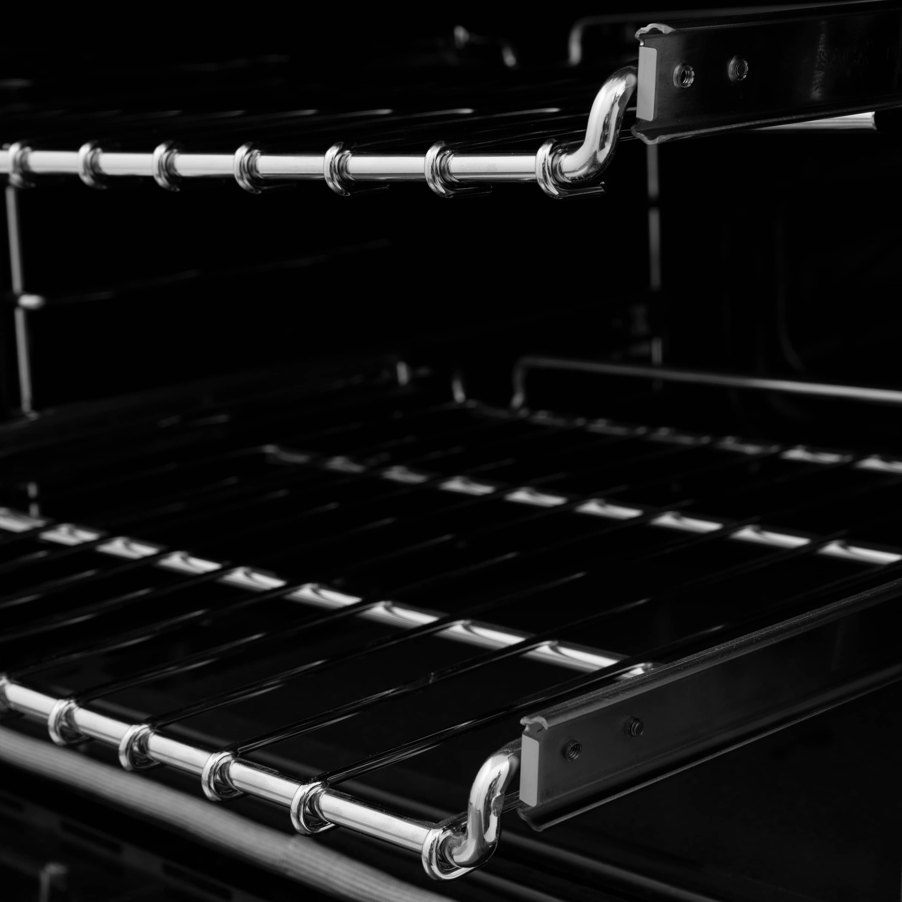 ZLINE 36-inch range oven interior with wire racks and black enamel walls