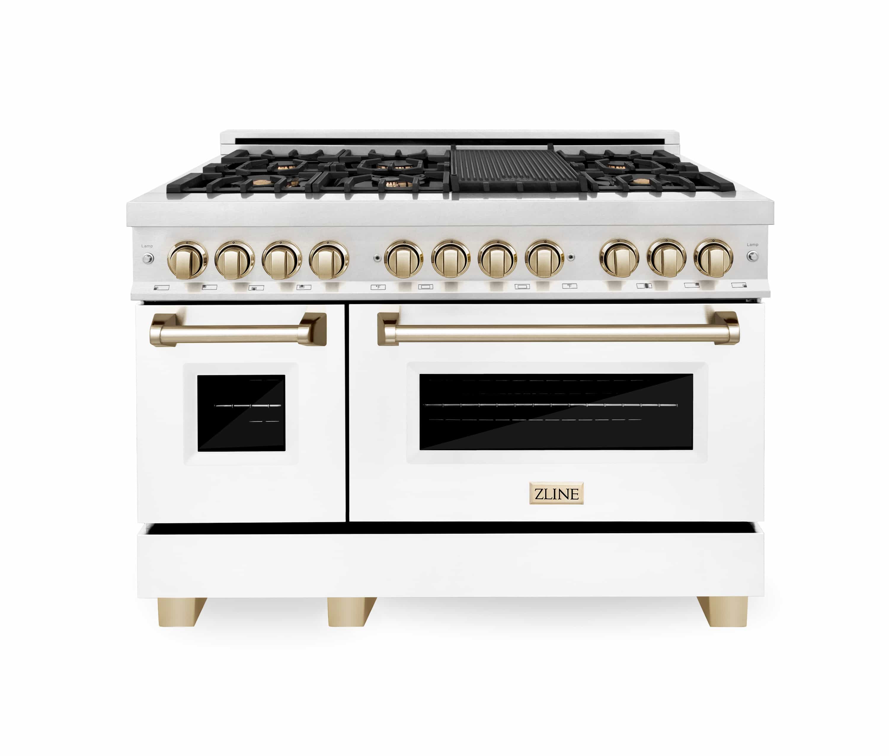 White range front with gold control knobs, black oven windows, and brass handles