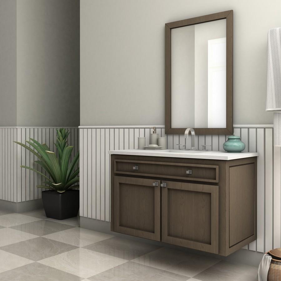 Chrome bath faucet with arched spout and two handles on bathroom vanity countertop