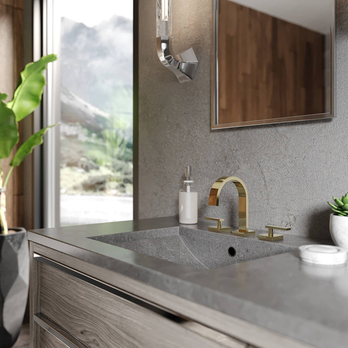 Gold bathroom faucet and towel ring mounted beside sink, polished finish