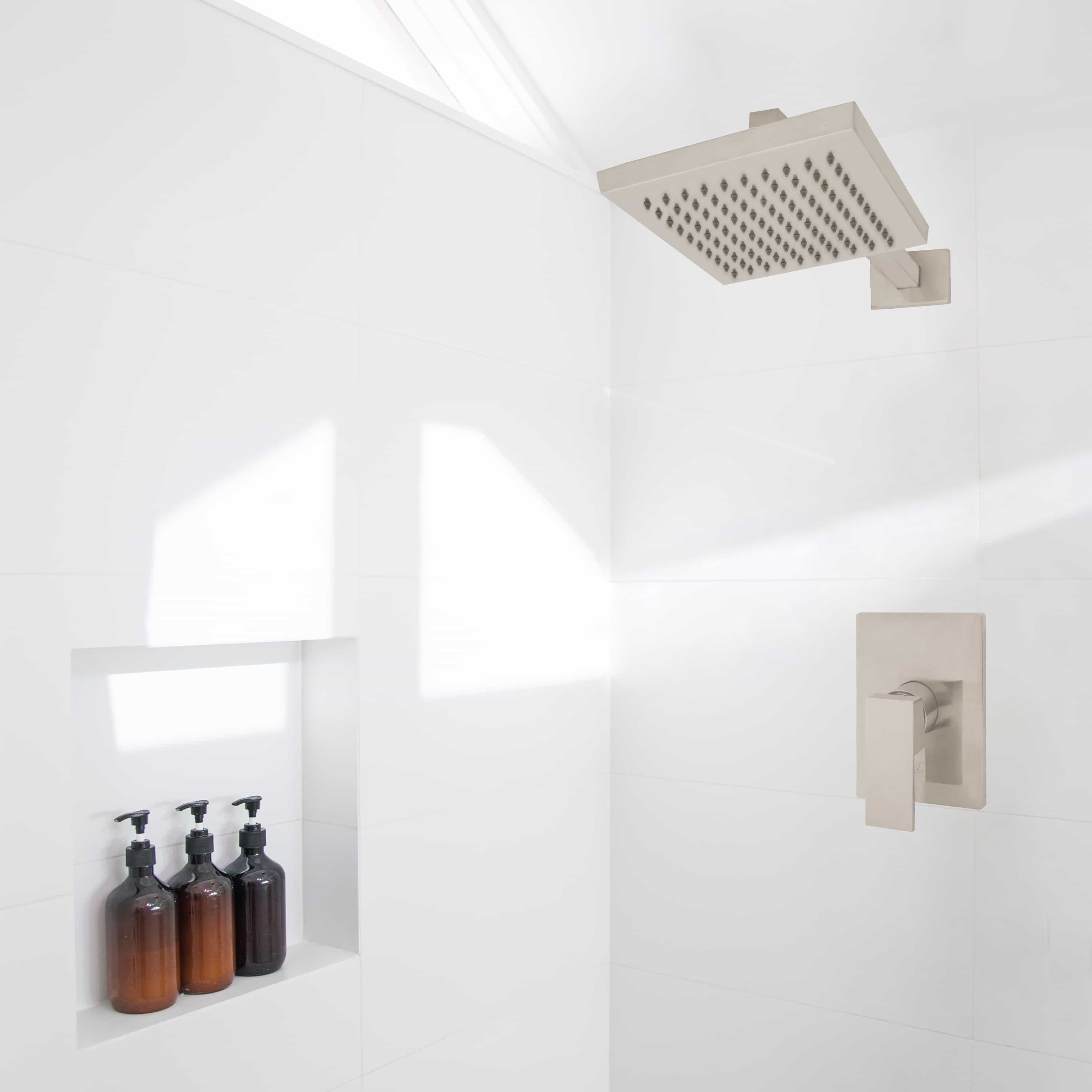 Brushed nickel shower system with overhead rain shower head and wall-mounted valve trim